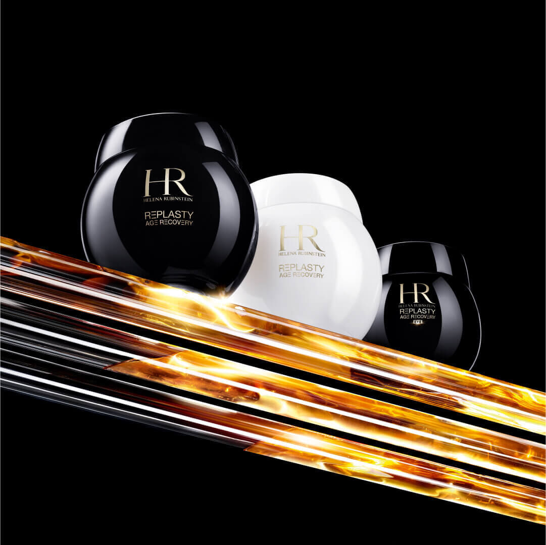 Trois pots de creme de la gamme Replasty d'Harry Roselmack, sur fond noir avec des lignes dorees.