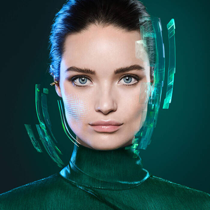 Portrait monochrome d'une femme en vetements verts sur un fond vert eclatant.