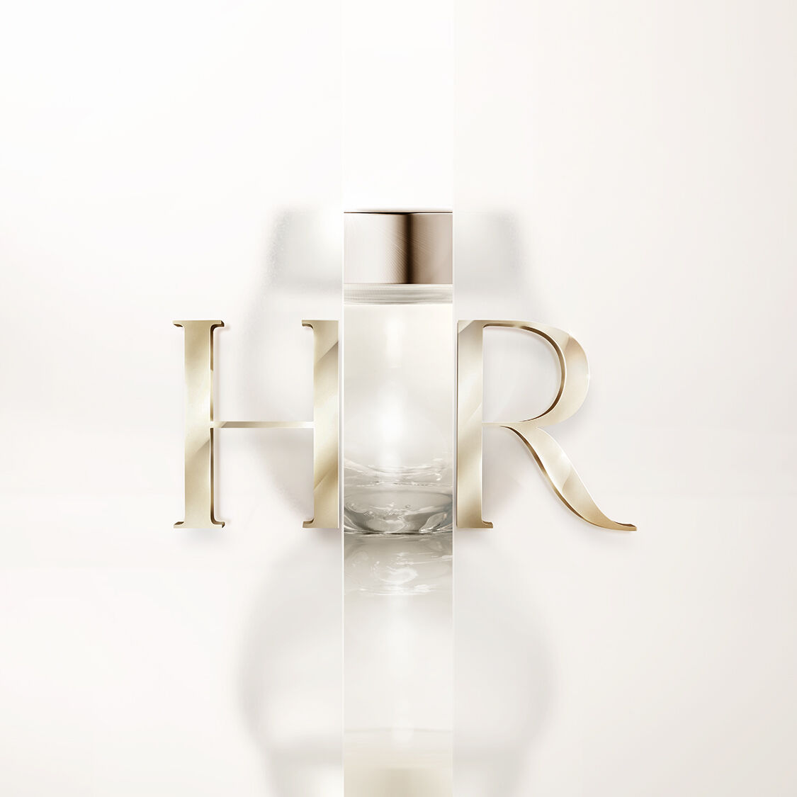 Flacon transparent Helena Rubinstein avec logo HR dore sur fond blanc.